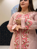 Woman in pink floral embroidered button-down co-ord set