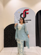 Graceful pastel blue crepe suit set featuring intricate hand embroidery and matching dupatta