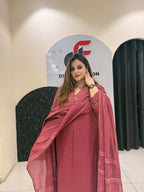 Graceful maroon pure cotton suit featuring delicate embroidery and a matching dupatta