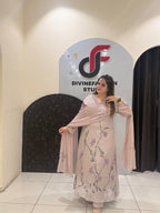 Graceful pastel pink Chinon suit featuring delicate handwork embroidery and a matching dupatta