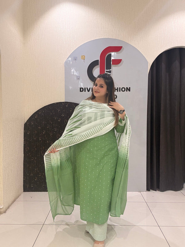 Refreshing mint green pure cotton suit featuring subtle geometric and dotted prints with a matching gradient dupatta