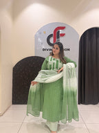 Refreshing mint green pure cotton suit featuring subtle geometric and dotted prints with a matching gradient dupatta