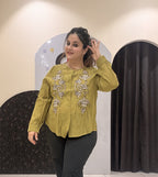 Stylish tops featuring intricate front embroidery and a classic button-up design