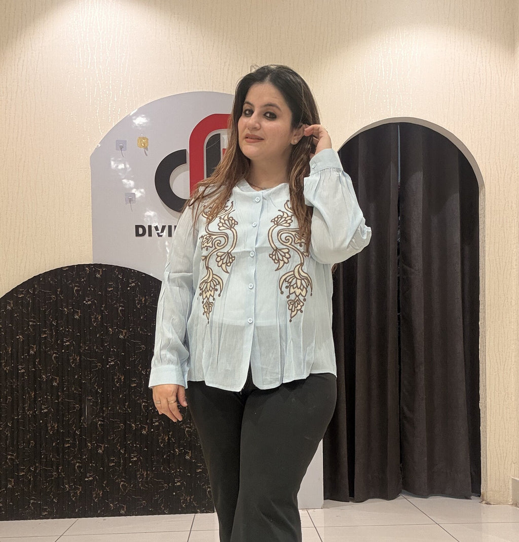 Stylish tops featuring intricate front embroidery and a classic button-up design