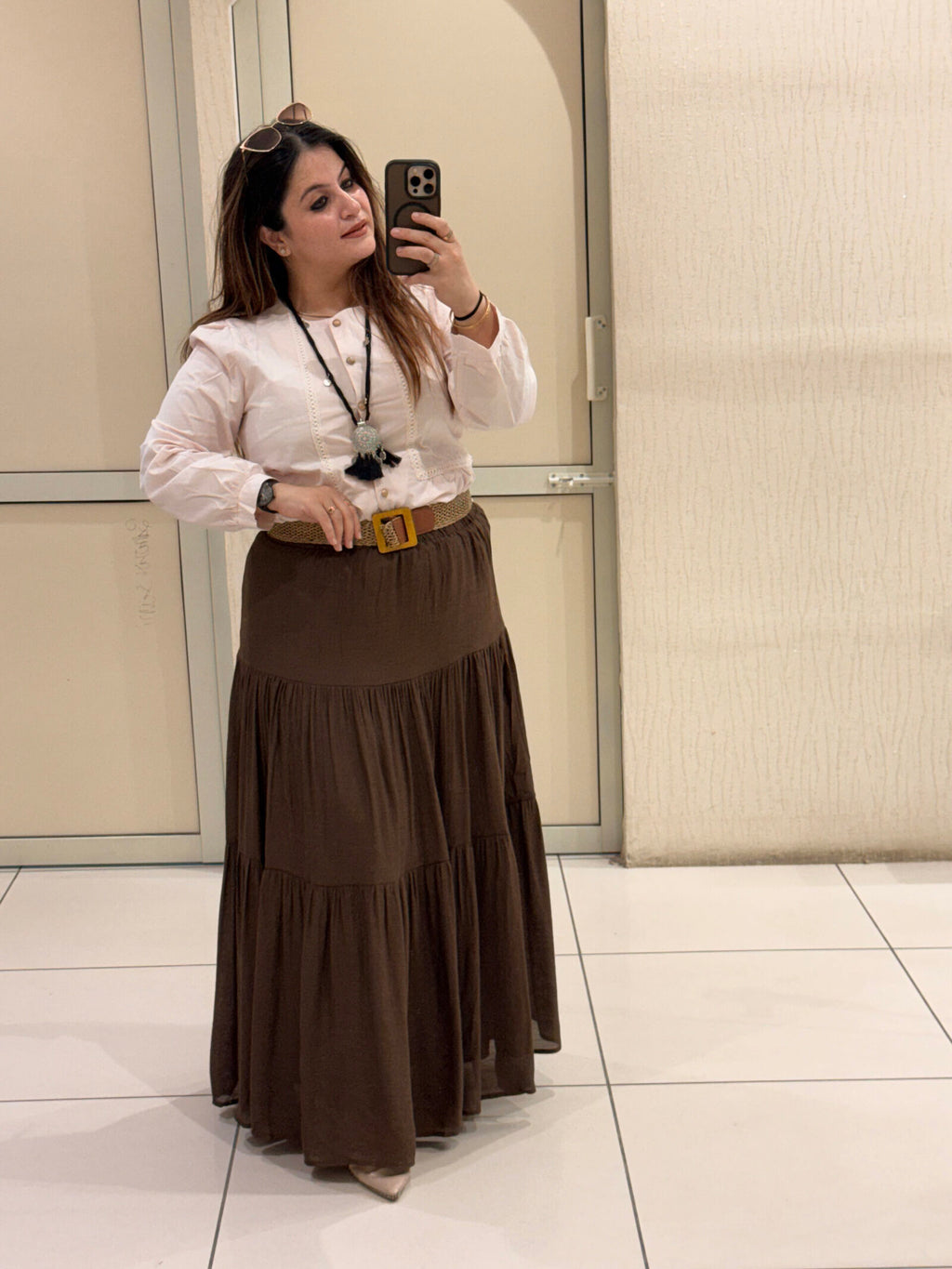 Elegant tiered maxi skirts crafted from soft cotton fabric, available in two timeless shades — brown and black. Perfect for casual outings, travel, or boho-chic styling.