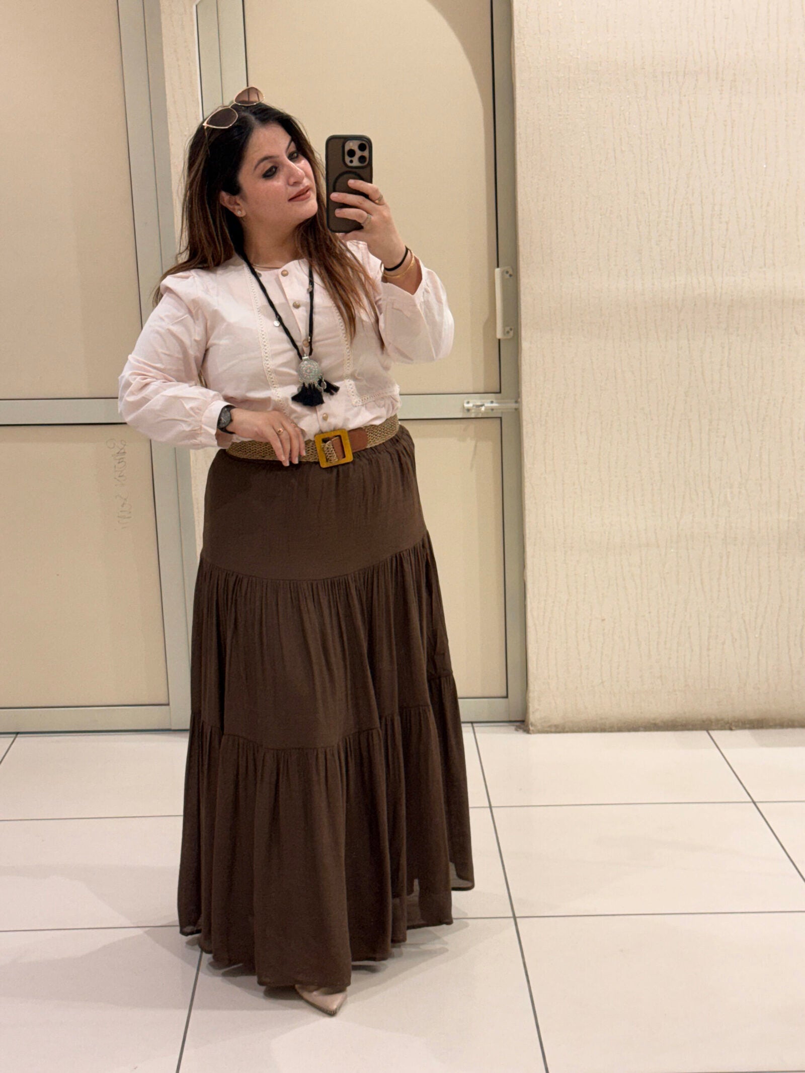Elegant tiered maxi skirts crafted from soft cotton fabric, available in two timeless shades — brown and black. Perfect for casual outings, travel, or boho-chic styling.