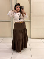 Elegant tiered maxi skirts crafted from soft cotton fabric, available in two timeless shades — brown and black. Perfect for casual outings, travel, or boho-chic styling.