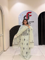 Premium grey unstitched mul cotton suit featuring intricate black thread embroidery and a matching dupatta
