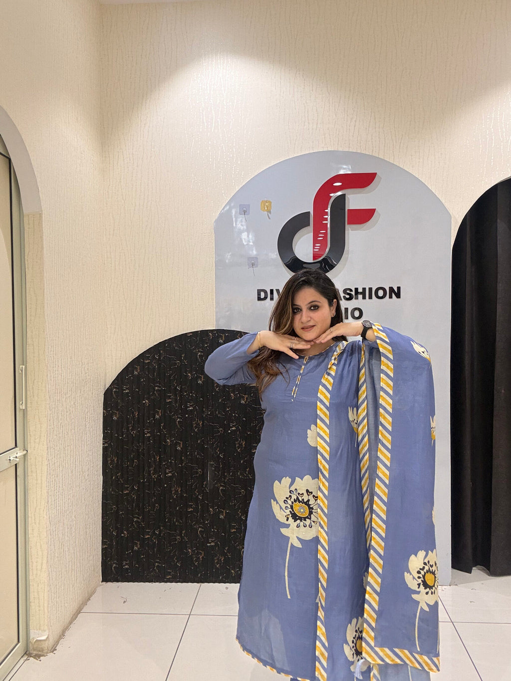 Graceful blue pure Maslin suit featuring large floral embroidery and a matching dupatta with striped borders