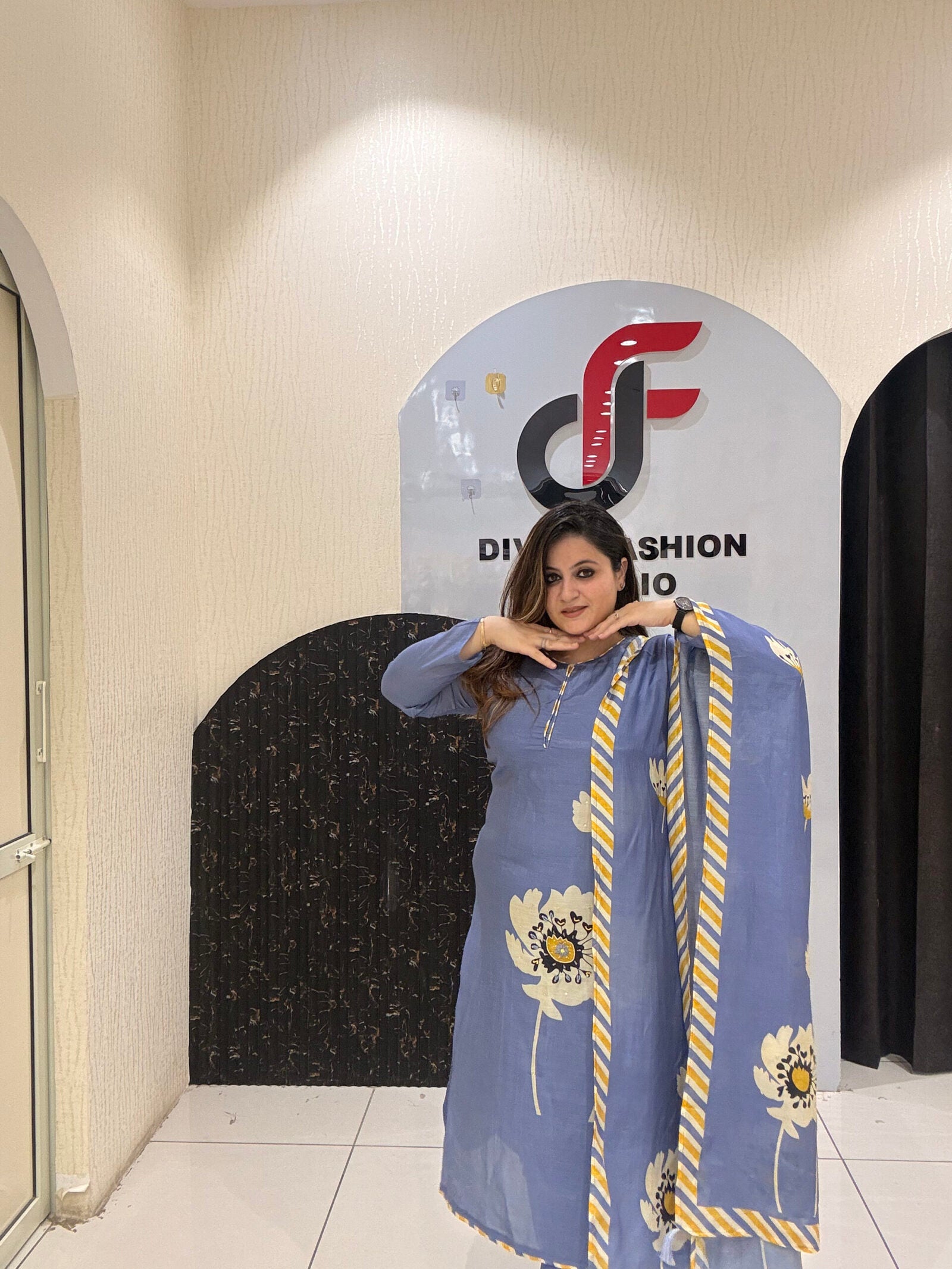 Graceful blue pure Maslin suit featuring large floral embroidery and a matching dupatta with striped borders