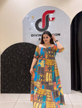 Eye-catching digital printed cotton middi featuring a mix of geometric and abstract patterns in rich hues of yellow, blue, and brown