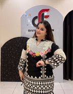 Stylish black cotton coord set featuring intricate geometric patterns and floral embroidery