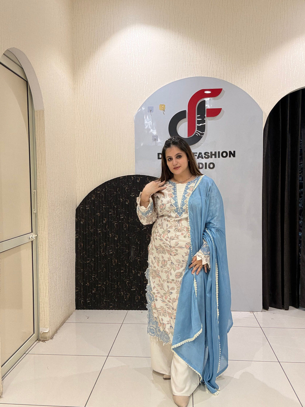 Graceful cotton Pakistani suit featuring delicate floral embroidery and a soothing blue dupatta