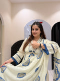 Graceful cream pure mul cotton suit featuring blue block-style prints and a matching dupatta.