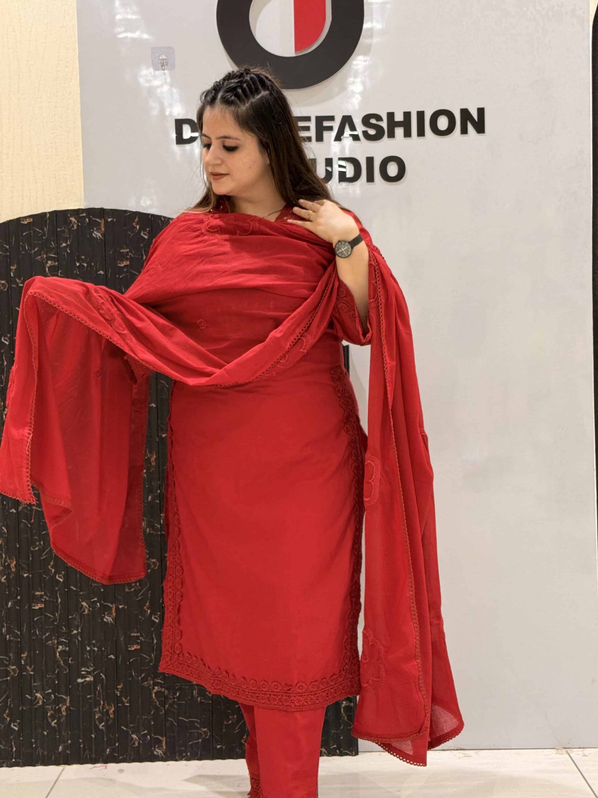 Woman in red floral embroidered co-ord set with dupatta