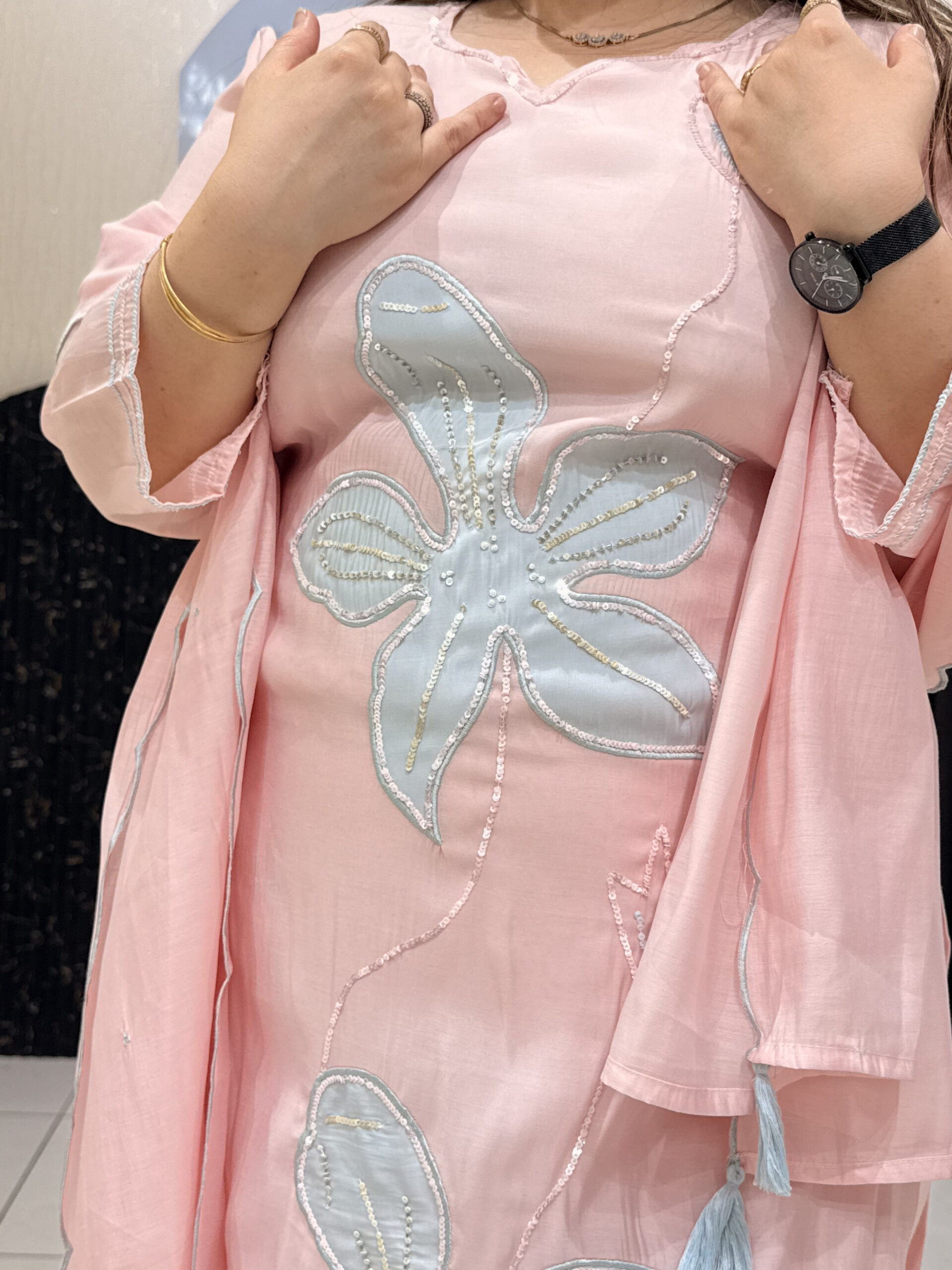 Pink floral embroidered co-ord set with light blue accents and sequins.