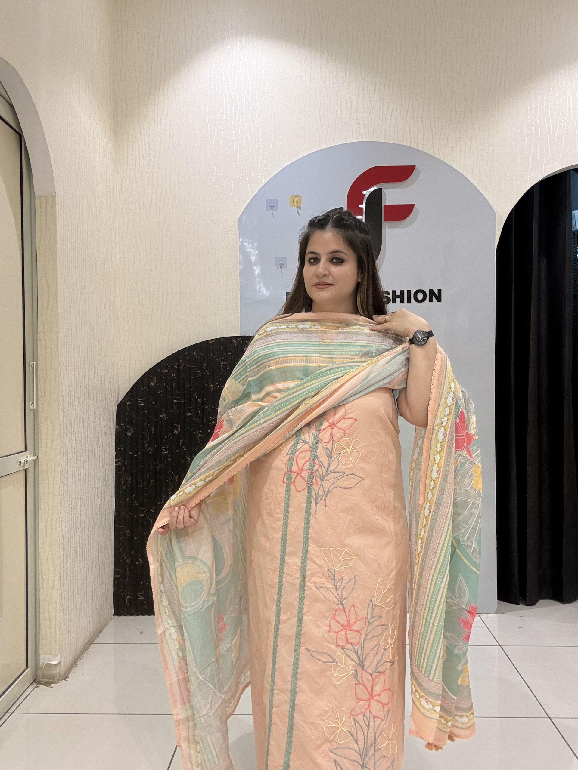 Elegant, unstitched cotton suits featuring delicate thread embroidery and pastel hues