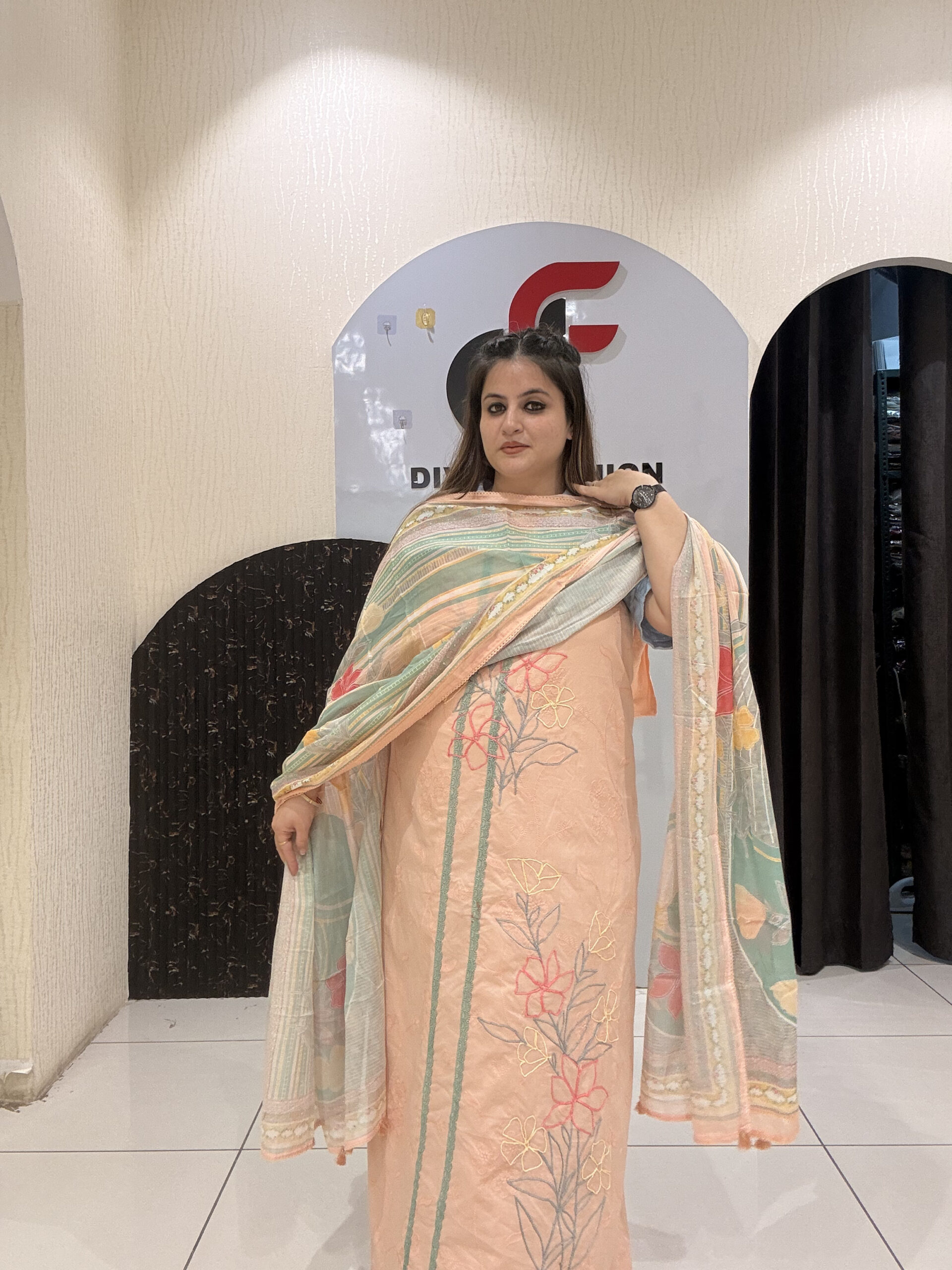 Elegant unstitched cotton suits featuring delicate thread embroidery and pastel hues