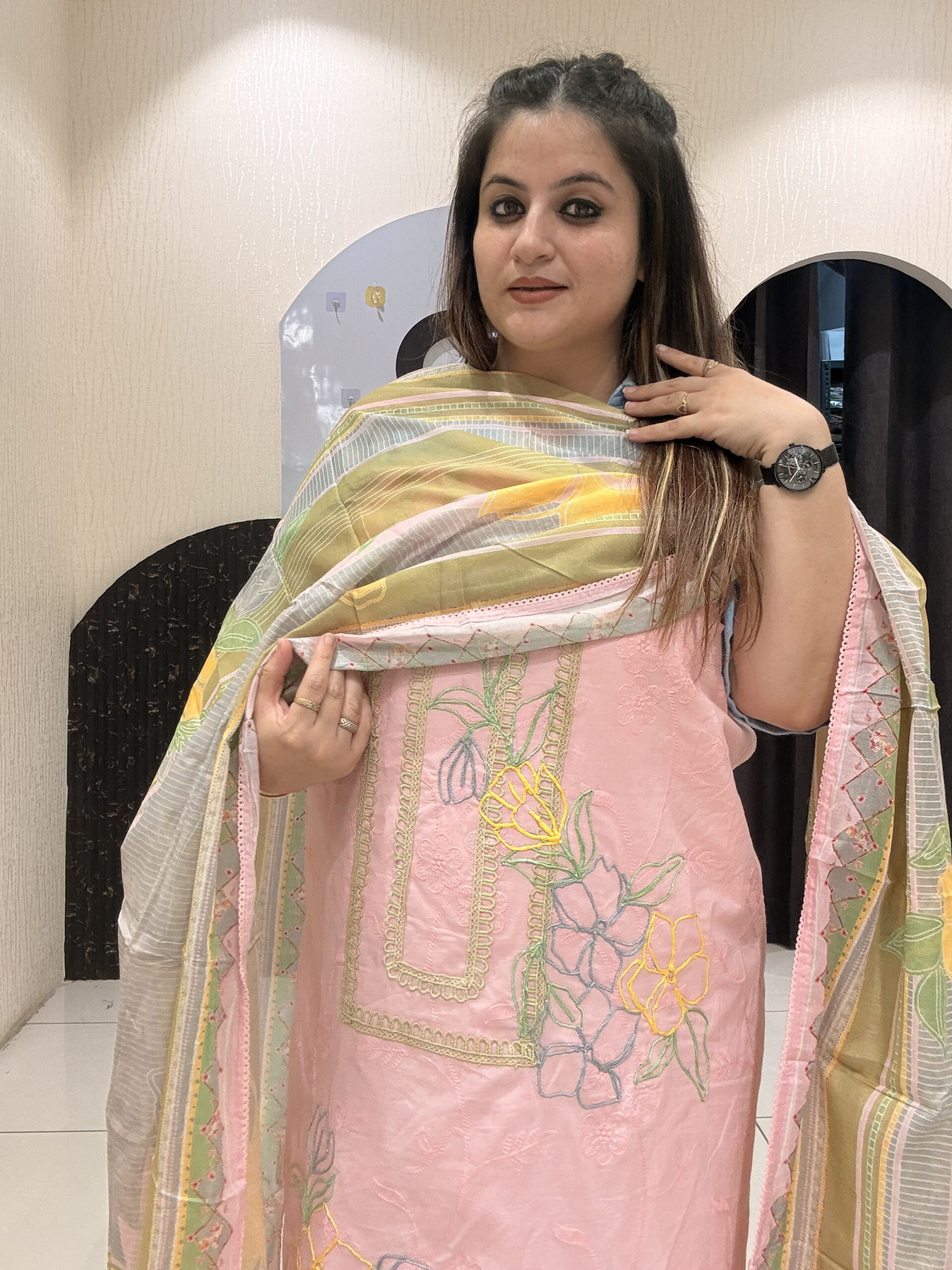 Elegant, unstitched cotton suits featuring delicate thread embroidery by Divine Fashion Studio