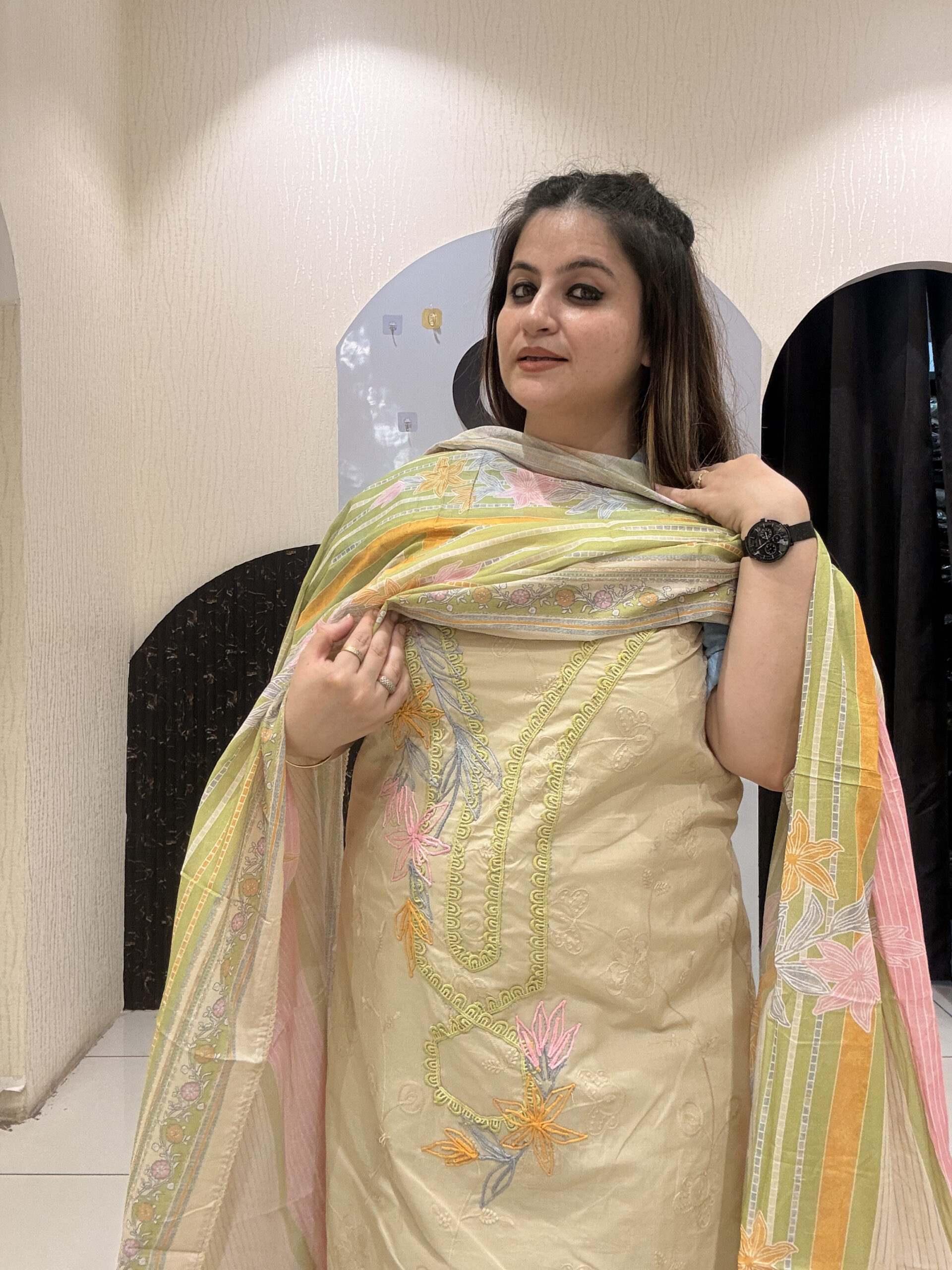 Elegant, unstitched cotton suits featuring delicate thread embroidery and pastel hues