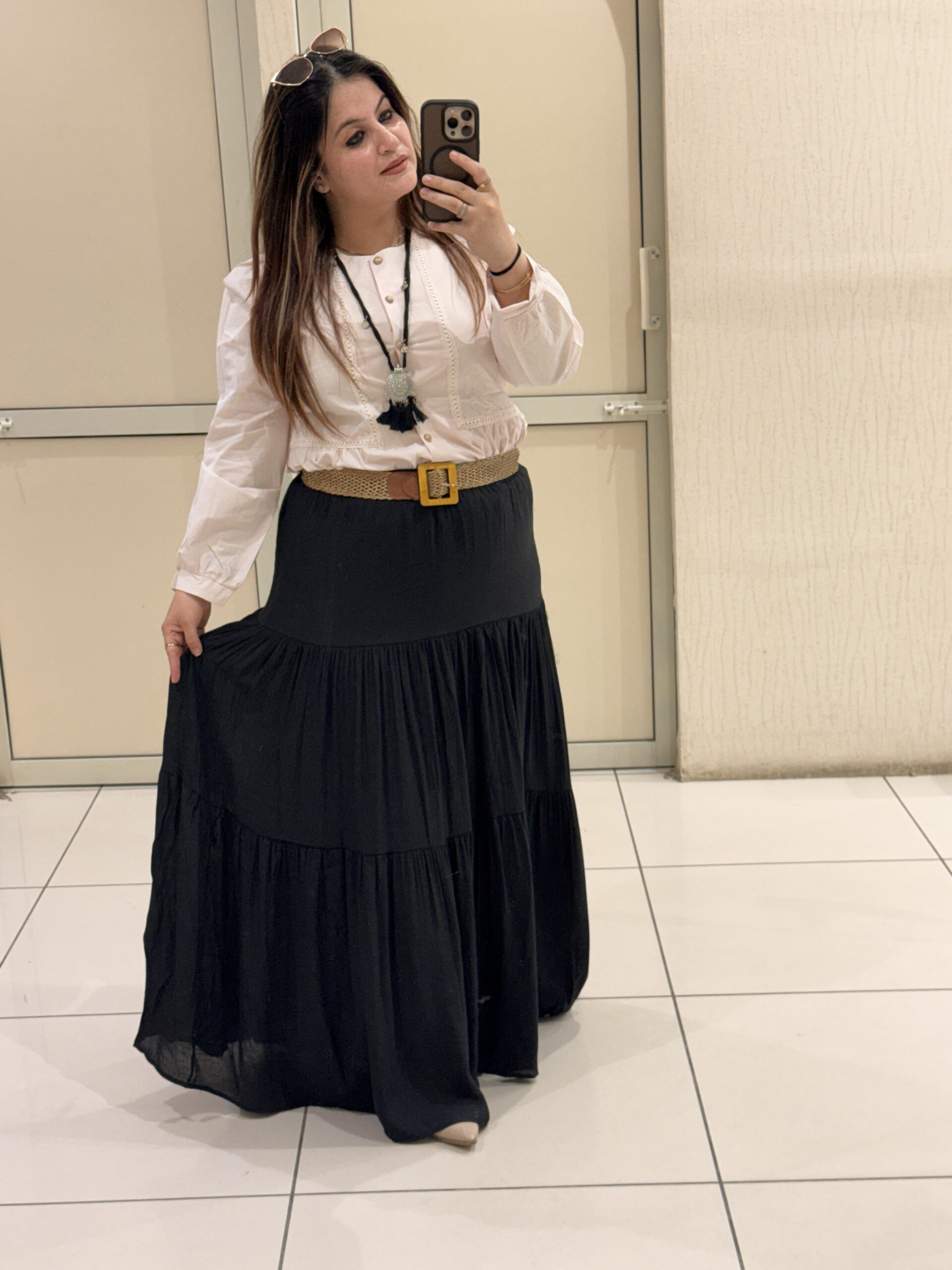 Elegant tiered maxi skirts crafted from soft cotton fabric, available in two timeless shades — brown and black. Perfect for casual outings, travel, or boho-chic styling.