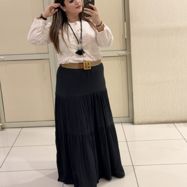 Elegant tiered maxi skirts crafted from soft cotton fabric, available in two timeless shades — brown and black. Perfect for casual outings, travel, or boho-chic styling.