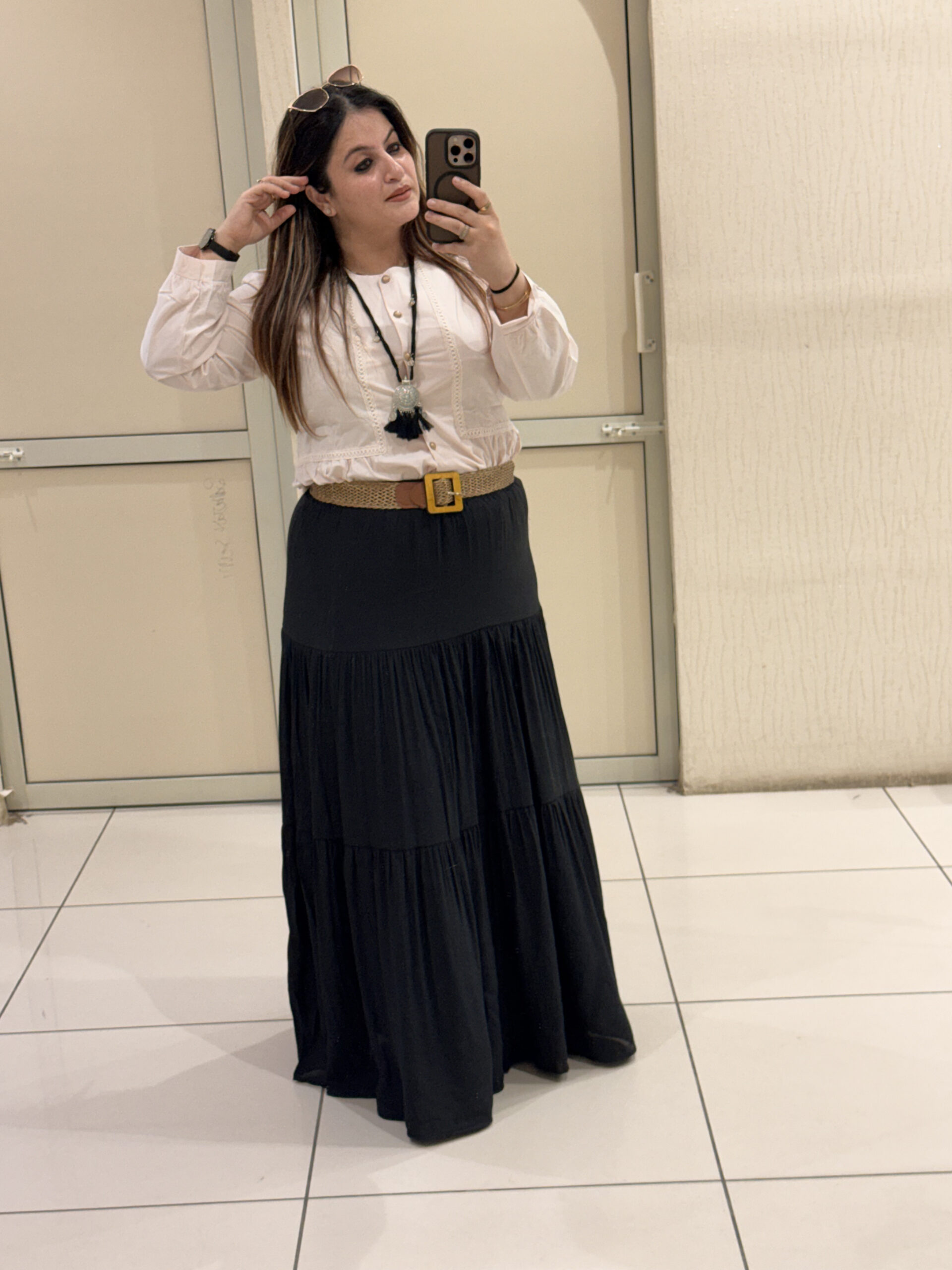 Elegant tiered maxi skirts crafted from soft cotton fabric, available in two timeless shades — brown and black. Perfect for casual outings, travel, or boho-chic styling.