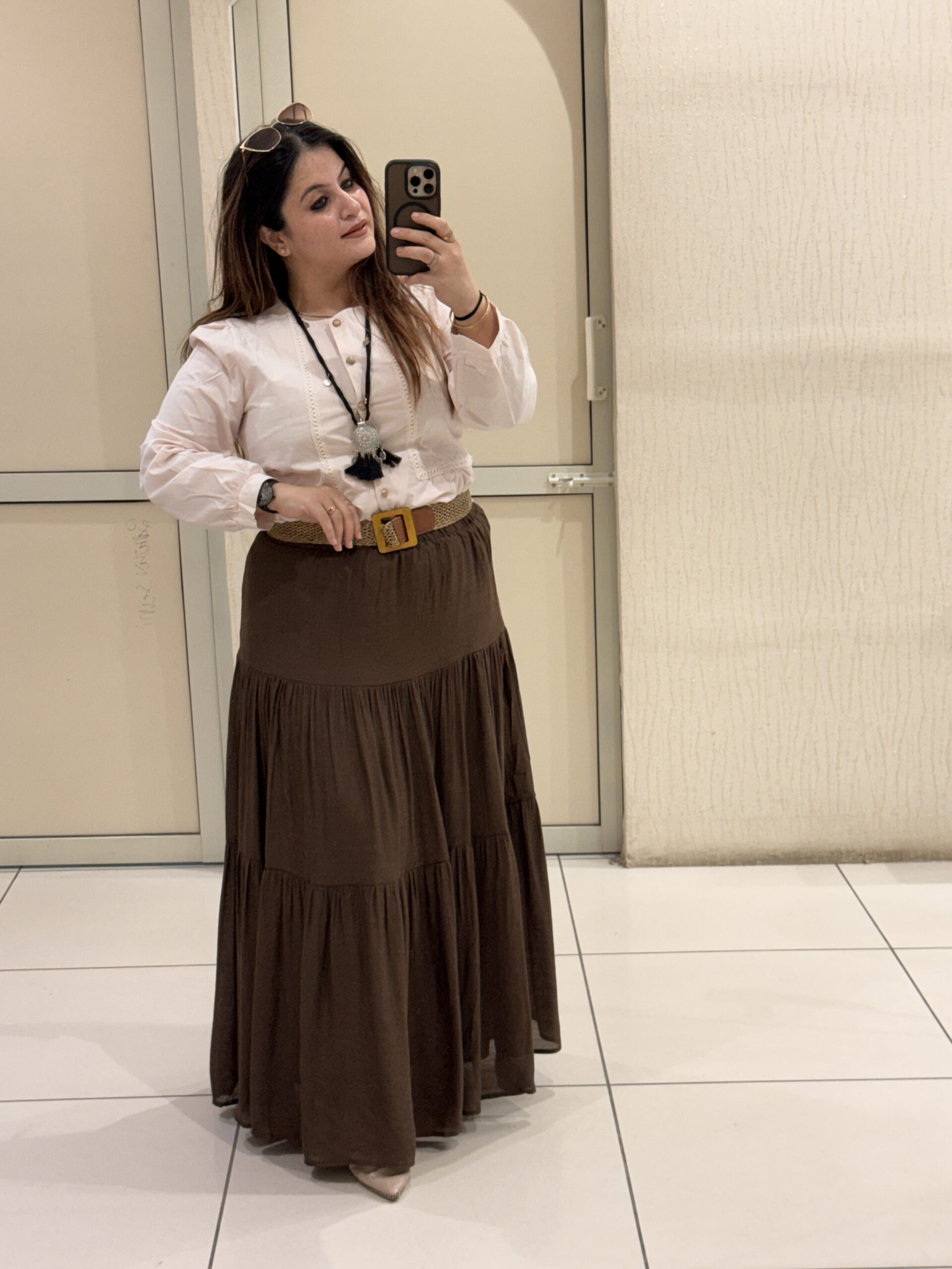 Elegant tiered maxi skirts crafted from soft cotton fabric, available in two timeless shades — brown and black. Perfect for casual outings, travel, or boho-chic styling.