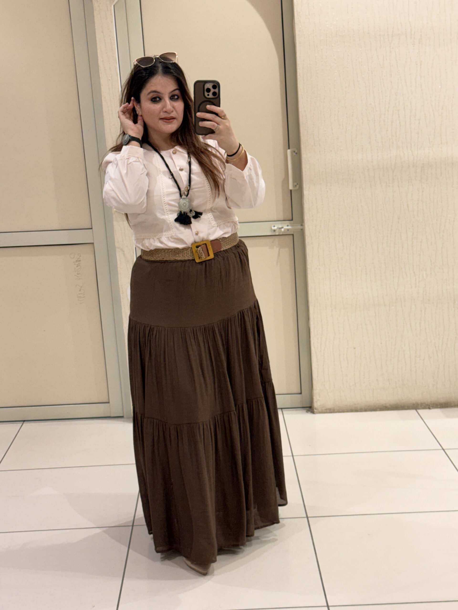 Elegant tiered maxi skirts crafted from soft cotton fabric, available in two timeless shades — brown and black. Perfect for casual outings, travel, or boho-chic styling.