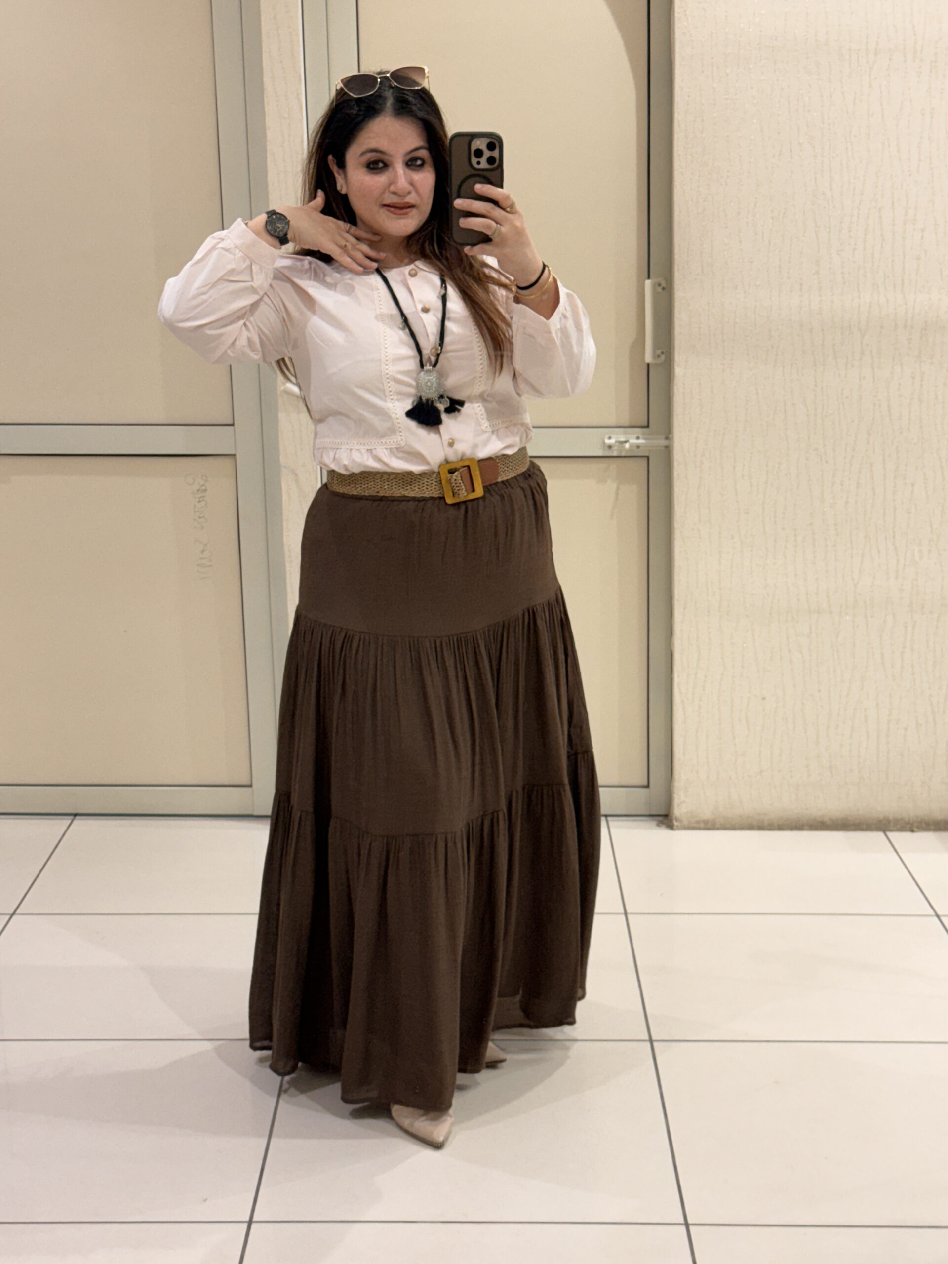 Elegant tiered maxi skirts crafted from soft cotton fabric, available in two timeless shades — brown and black. Perfect for casual outings, travel, or boho-chic styling.