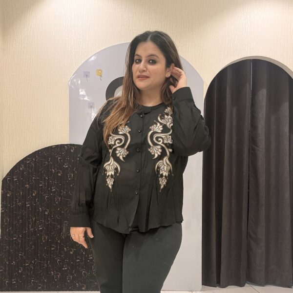 Stylish tops featuring intricate front embroidery and a classic button-up design