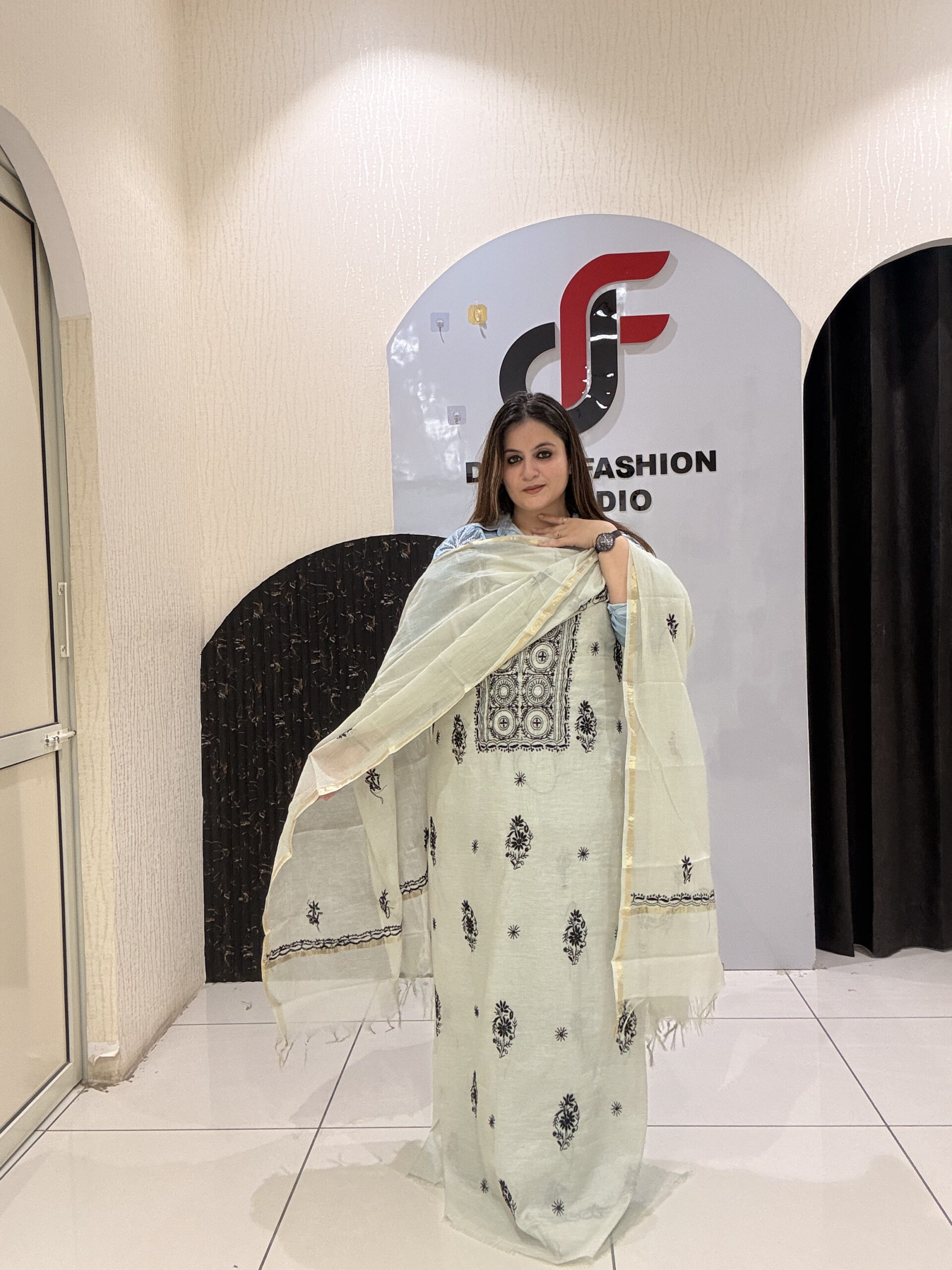 Premium grey unstitched mul cotton suit featuring intricate black thread embroidery and a matching dupatta