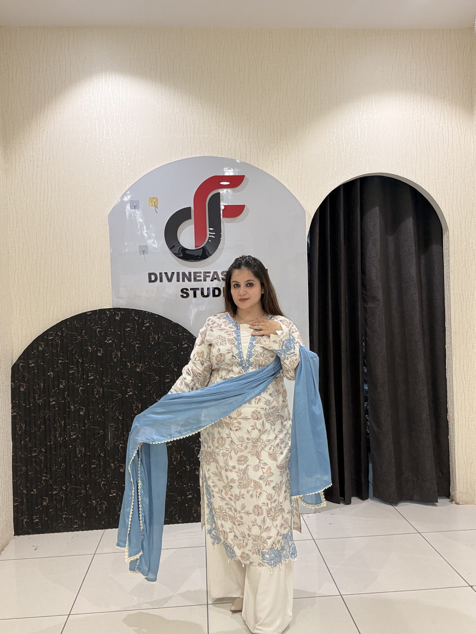 Graceful cotton Pakistani suit featuring delicate floral embroidery and a soothing blue dupatta