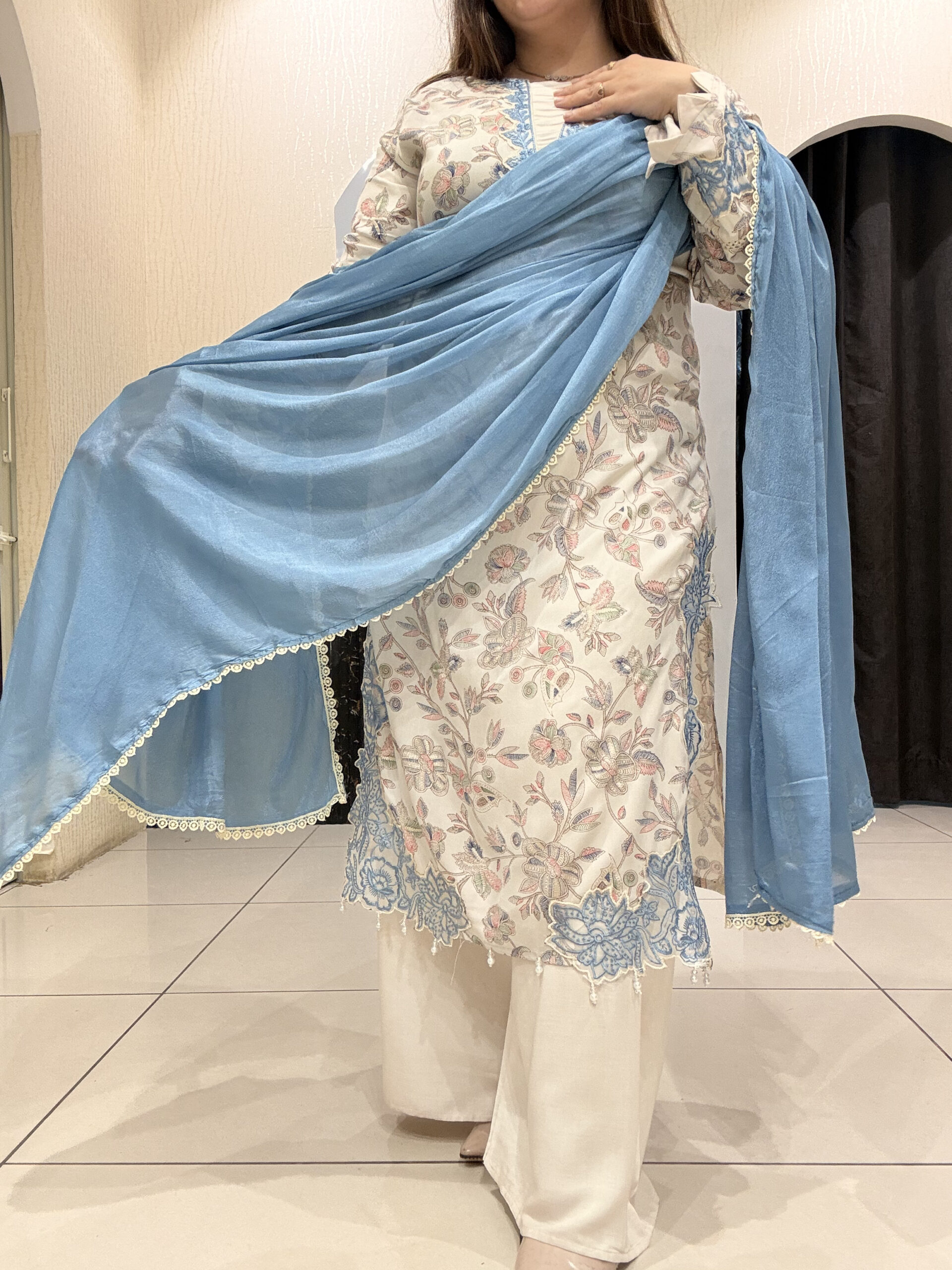 Graceful cotton Pakistani suit featuring delicate floral embroidery and a soothing blue dupatta