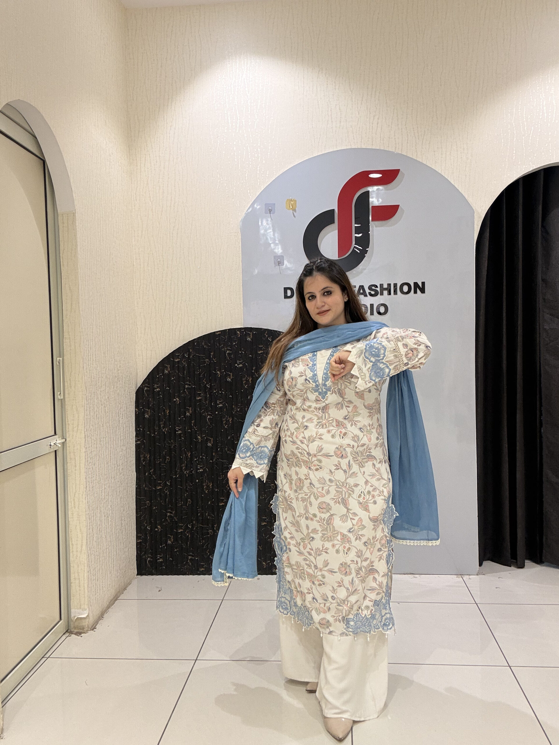 Graceful cotton Pakistani suit featuring delicate floral embroidery and a soothing blue dupatta