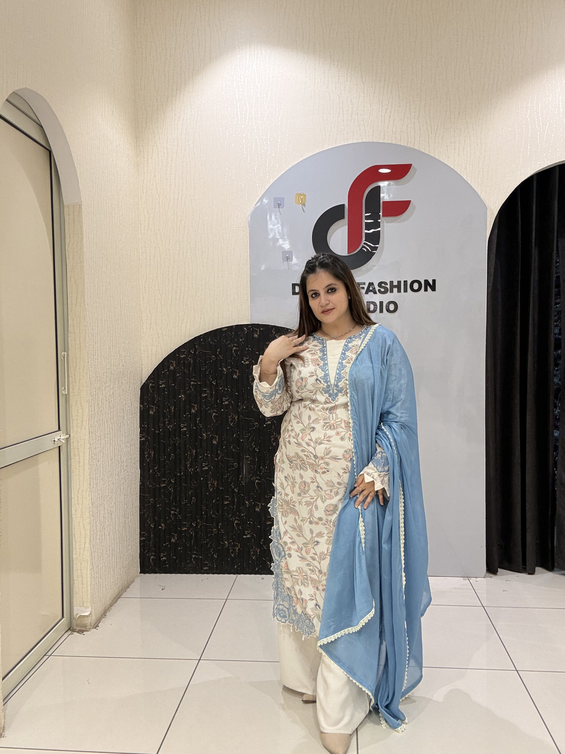 Graceful cotton Pakistani suit featuring delicate floral embroidery and a soothing blue dupatta