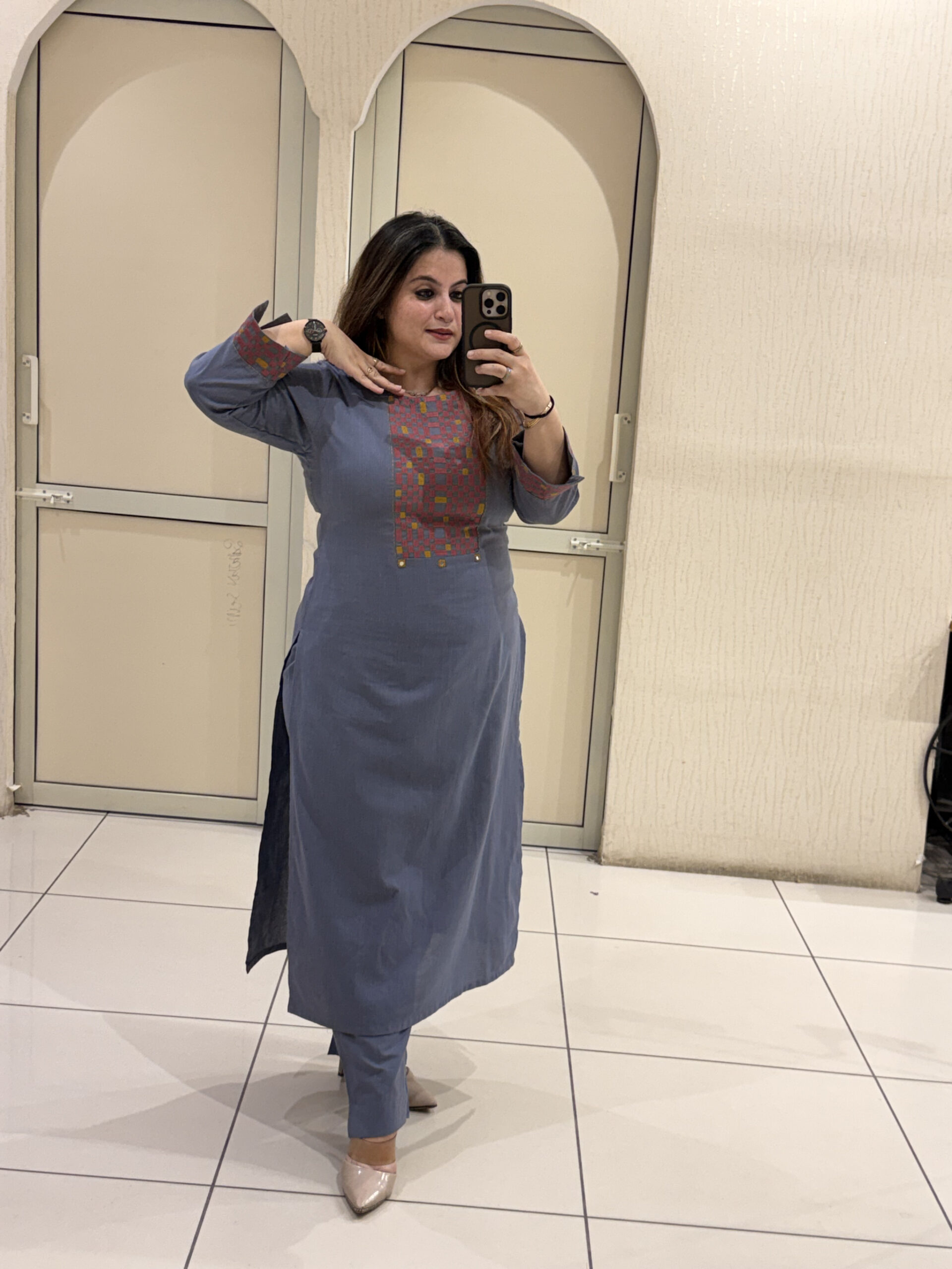Elegant blue cotton two-piece outfit featuring intricate embroidery on the neckline and cuffs. Perfect for office wear, travel, or casual outings.
