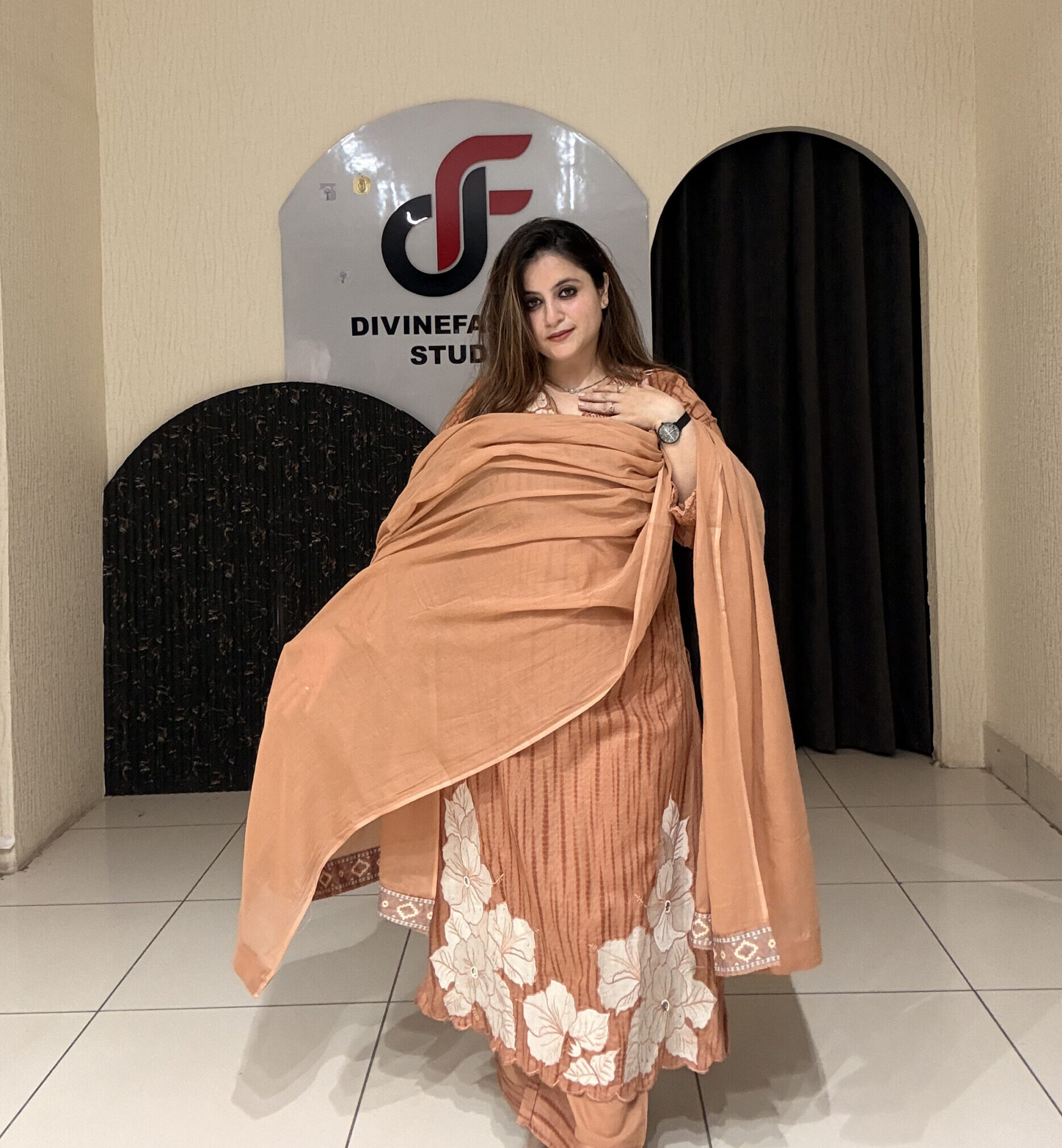 Graceful peach pure cotton suit featuring delicate white thread embroidery and a matching dupatta. Perfect for festive occasions, office wear, or elegant day outings