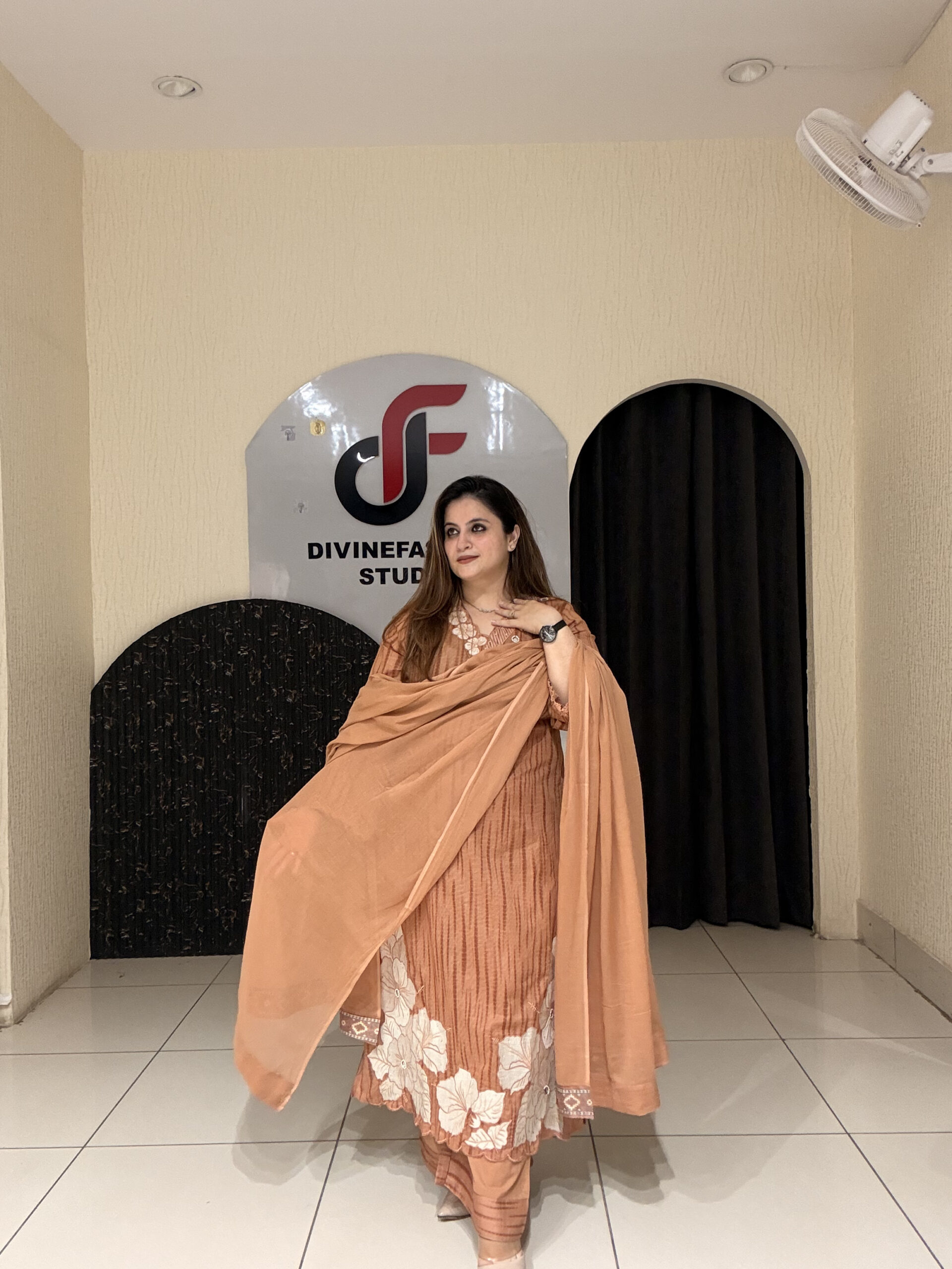 Graceful peach pure cotton suit featuring delicate white thread embroidery and a matching dupatta. Perfect for festive occasions, office wear, or elegant day outings