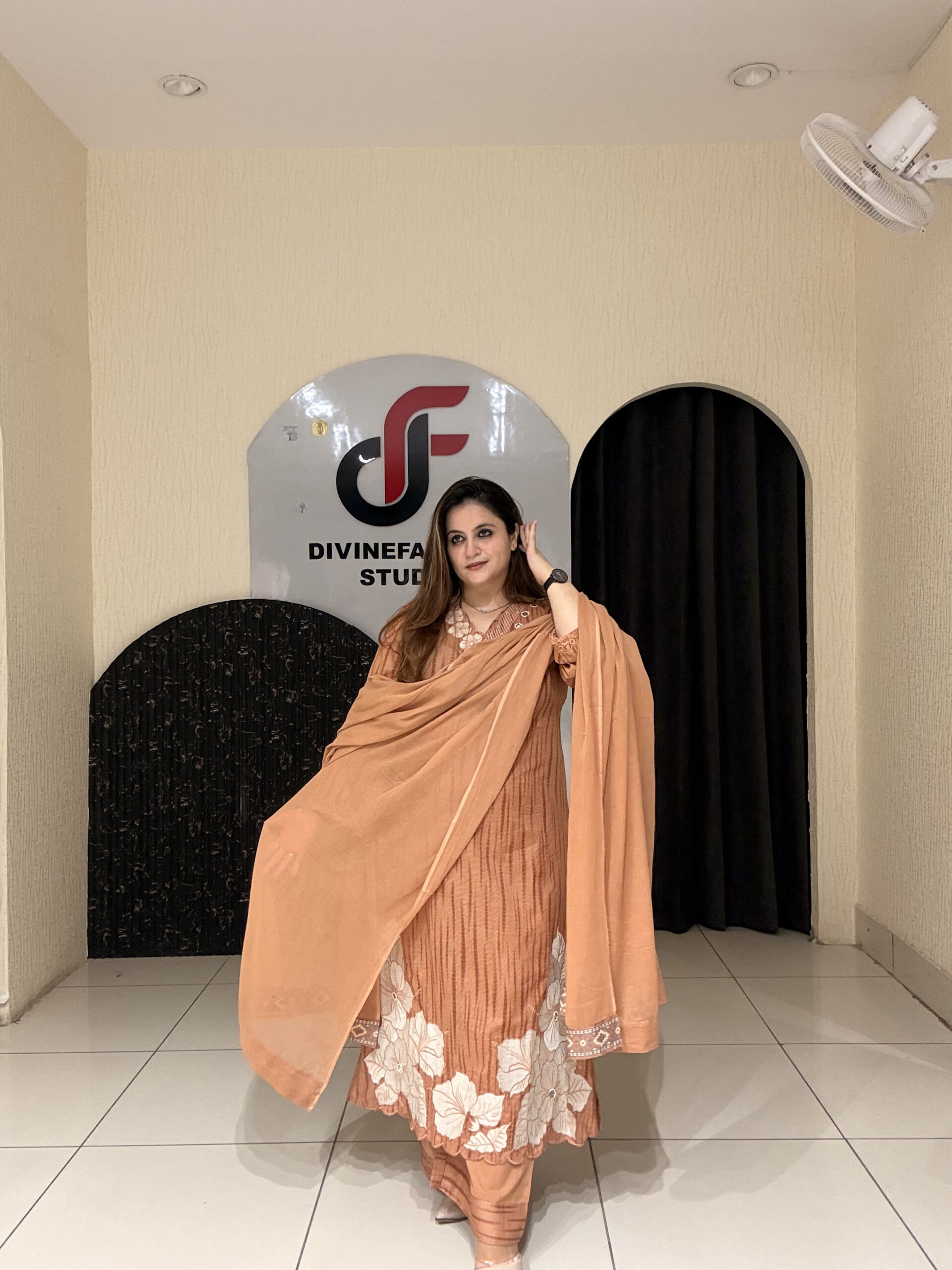 Graceful peach pure cotton suit featuring delicate white thread embroidery and a matching dupatta. Perfect for festive occasions, office wear, or elegant day outings