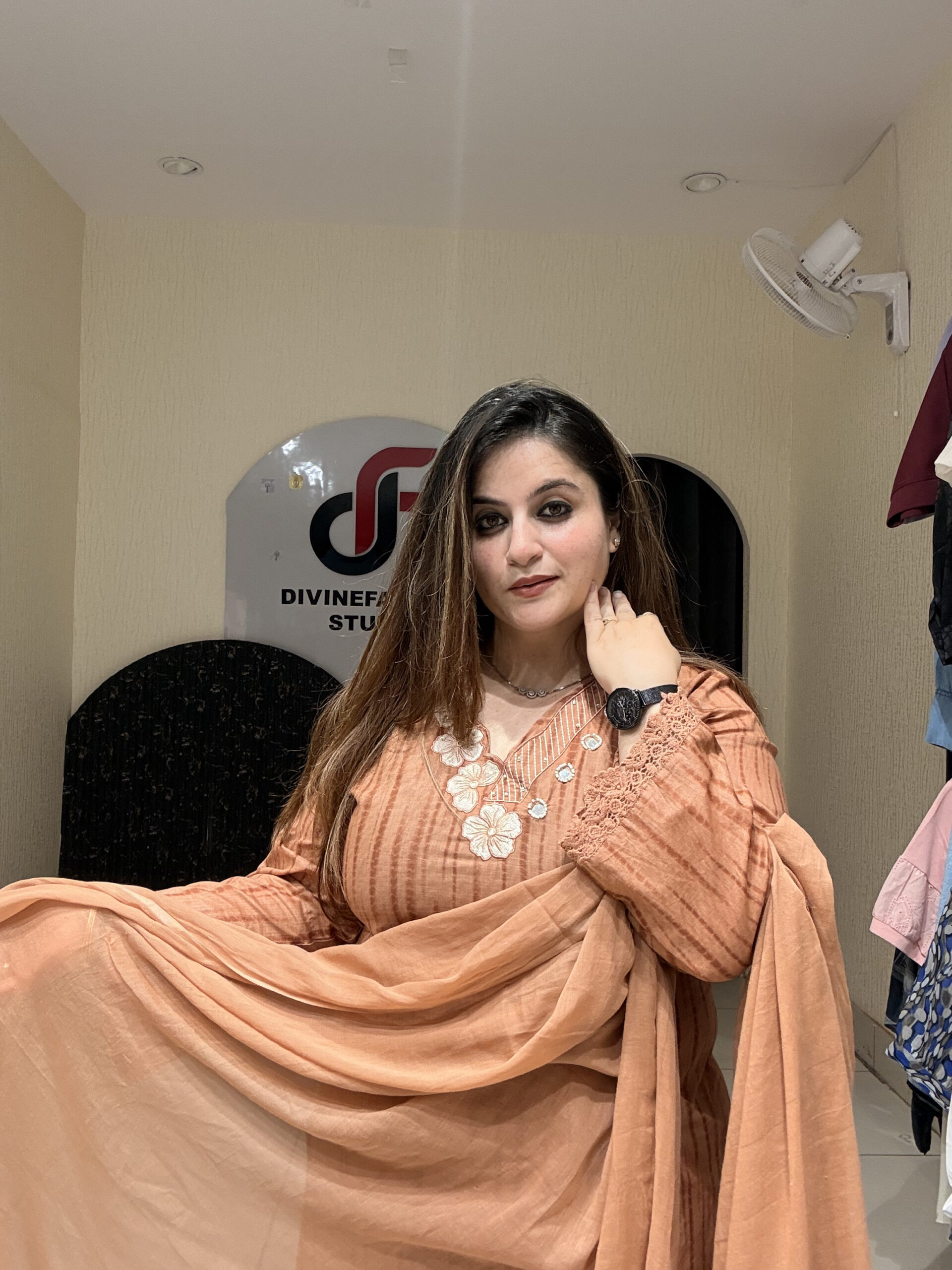 Graceful peach pure cotton suit featuring delicate white thread embroidery and a matching dupatta. Perfect for festive occasions, office wear, or elegant day outings.